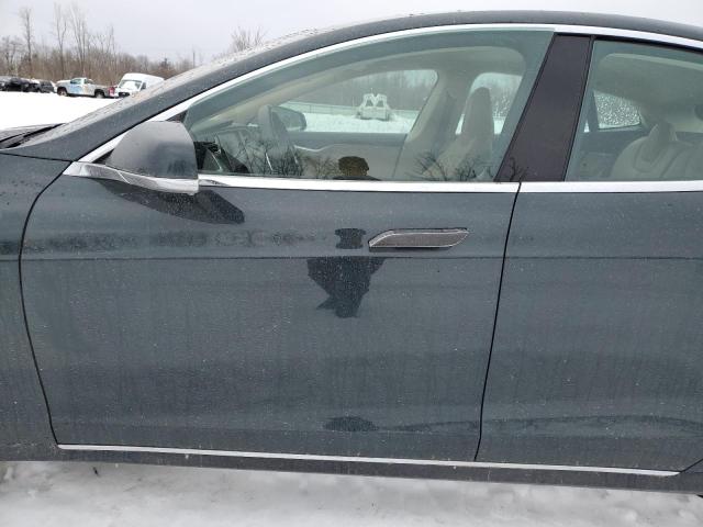 Photo 7 from auction – 2014 TESLA MODEL S with VIN 5YJSA1H13EFP34083