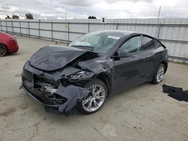 TESLA MODEL Y 2022 with VIN 7SAYGDEEXNF348524 - Photo from auction