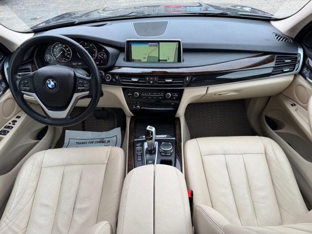 Photo 9 from auction – 2015 BMW X5 XDRIVE3 with VIN 5UXKS4C59F0N06077