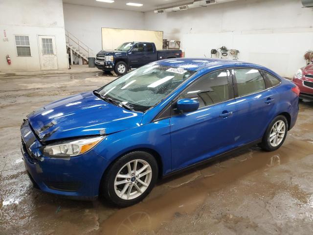 FORD FOCUS SE 2018 with VIN 1FADP3FE9JL302068 - Photo from auction