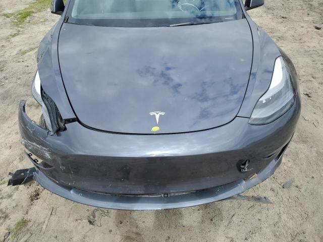 Photo 11 from auction – 2023 TESLA MODEL 3 with VIN 5YJ3E1EA5PF585210