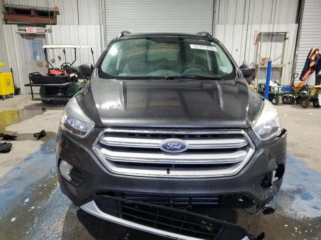 Photo 5 from auction – 2018 FORD ESCAPE SE with VIN 1FMCU9G90JUB48553