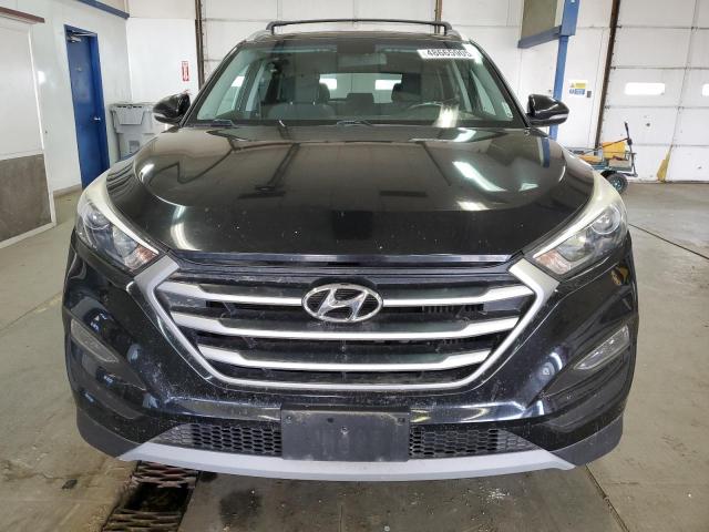 Photo 5 from auction – 2017 HYUNDAI TUCSON LIM with VIN KM8J3CA25HU446643