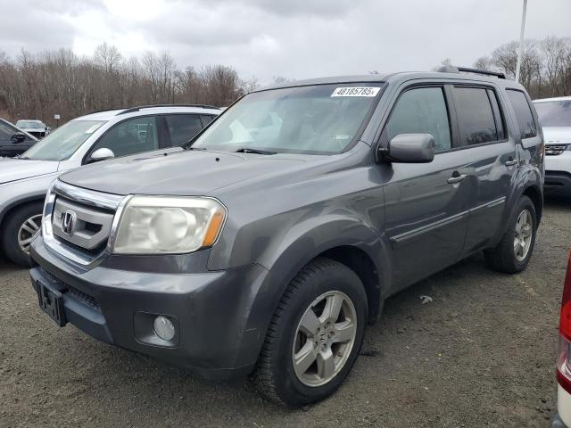 HONDA PILOT EXL 2011 with VIN 5FNYF4H51BB076338 - Photo from auction