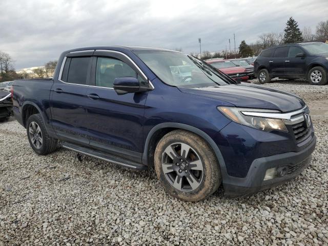 Снимка 4 от търг – 2017 HONDA RIDGELINE с VIN 5FPYK2F66HB007088