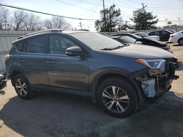 Photo 4 from auction – 2017 TOYOTA RAV4 XLE with VIN JTMRFREV1HD219164