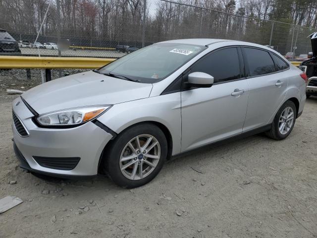 FORD FOCUS SE 2018 with VIN 1FADP3F27JL202346 - Photo from auction