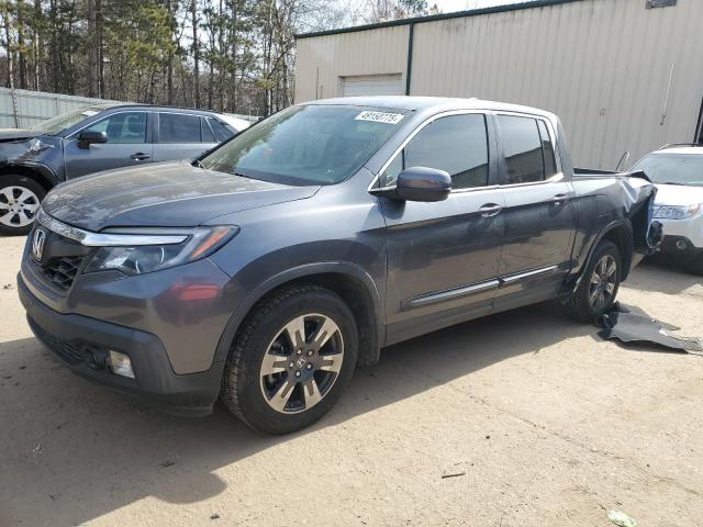 HONDA RIDGELINE 2017 with VIN 5FPYK2F65HB010628 - Photo from auction