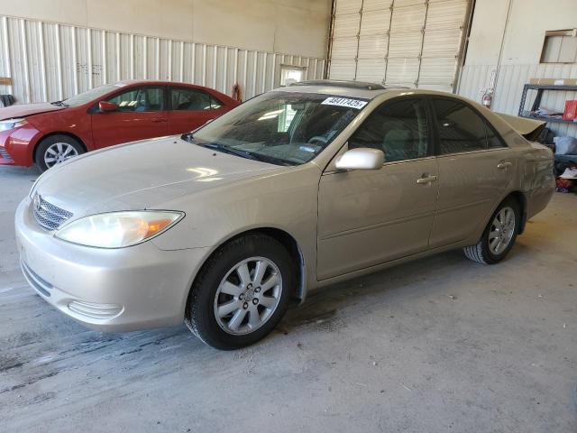 TOYOTA CAMRY LE 2004 with VIN 4T1BE32K24U877481 - Photo from auction