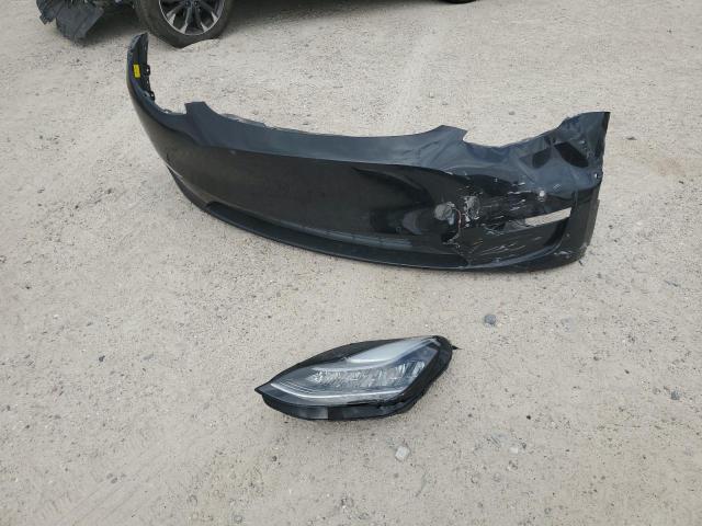 Photo 13 from auction – 2021 TESLA MODEL Y with VIN 5YJYGDEE1MF116129
