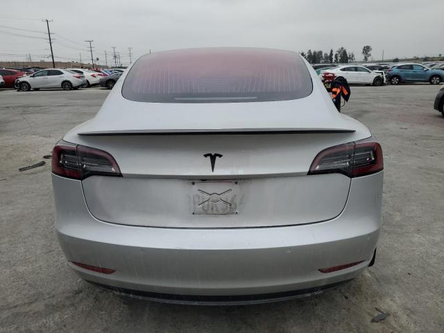 Снимка 6 от търг – 2018 TESLA MODEL 3 с VIN 5YJ3E1EA8JF007870
