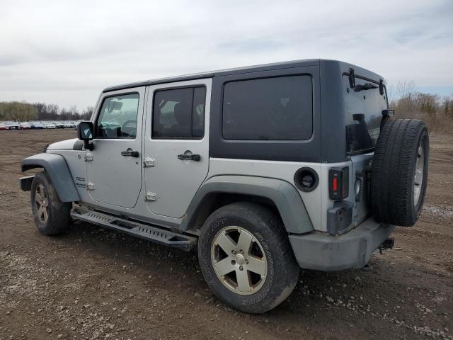 Снимка 2 от търг – 2011 JEEP WRANGLER U с VIN 1J4BA3H18BL579996