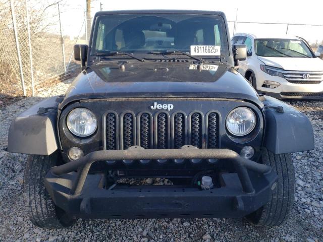 Photo 5 from auction – 2016 JEEP WRANGLER U with VIN 1C4BJWDG6GL189746
