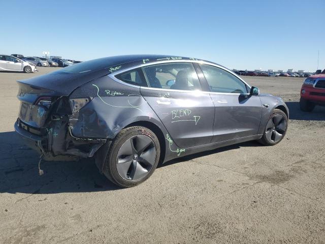 Снимка 3 от търг – 2018 TESLA MODEL 3 с VIN 5YJ3E1EB7JF089714