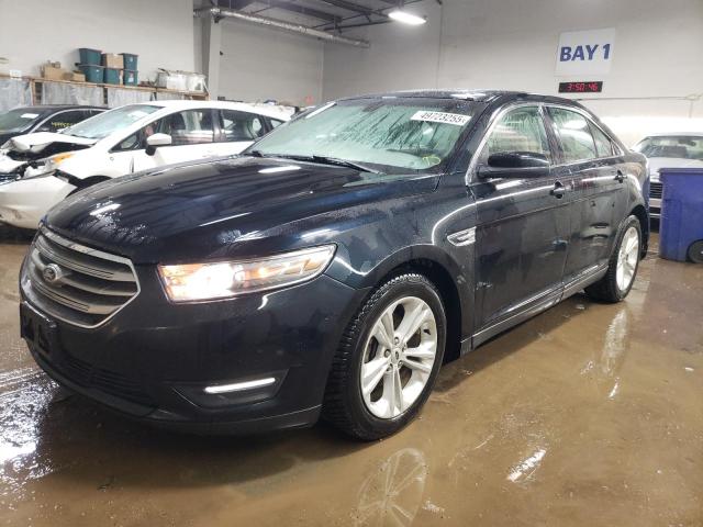 FORD TAURUS SEL 2014 with VIN 1FAHP2H88EG140418 - Photo from auction