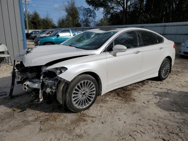 FORD FUSION TIT 2014 with VIN 3FA6P0D9XER161497 - Photo from auction
