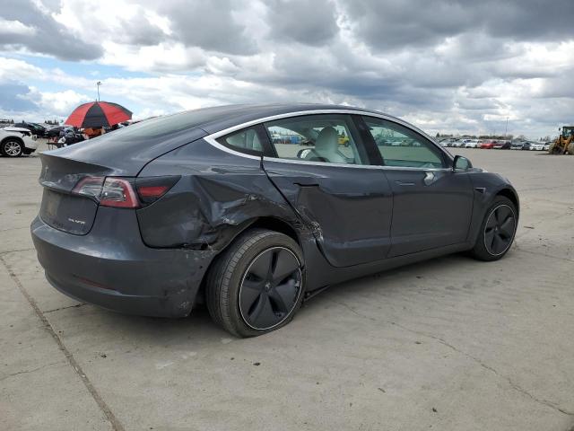 Снимка 3 от търг – 2018 TESLA MODEL 3 с VIN 5YJ3E1EB4JF096099