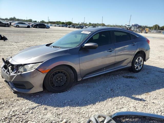 HONDA CIVIC 2018 with VIN 19XFC2F52JE013180 - Photo from auction