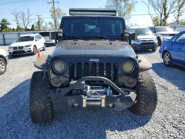 Photo 5 from auction – 2014 JEEP WRANGLER U with VIN 1C4BJWDGXEL269693