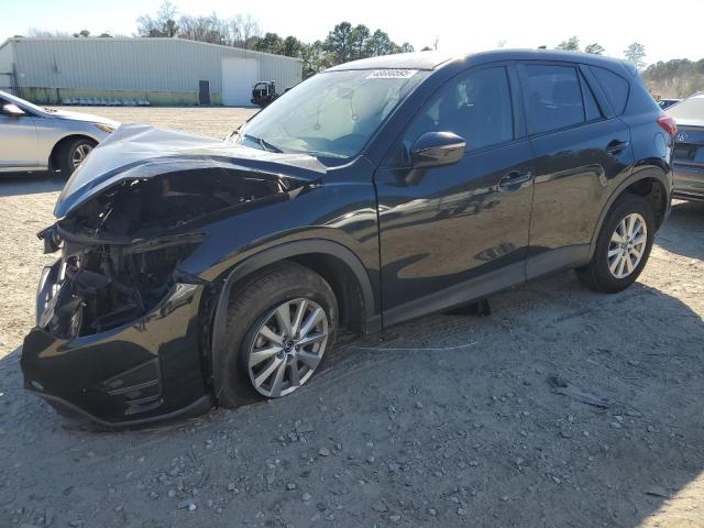 MAZDA CX-5 SPORT 2016 with VIN JM3KE2BY7G0744799 - Photo from auction