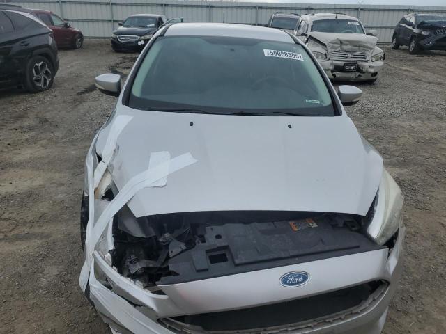 Снимка 11 от търг – 2016 FORD FOCUS SE с VIN 1FADP3F20GL255527