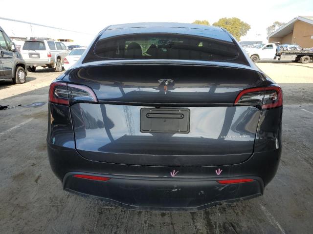 Снимка 6 от търг – 2024 TESLA MODEL Y с VIN 7SAYGDEE2RF080431