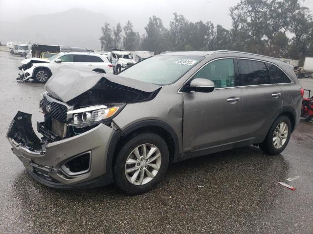 KIA SORENTO LX 2016 with VIN 5XYPGDA31GG065180 - Photo from auction