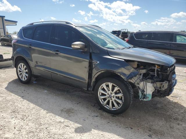 Photo 4 from auction – 2017 FORD ESCAPE TIT with VIN 1FMCU0J95HUF02694