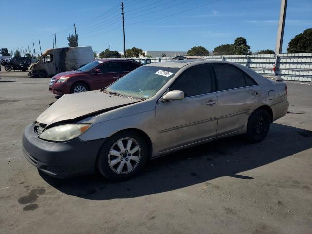 TOYOTA CAMRY LE 2004 with VIN 4T1BF32K64U064660 - Photo from auction