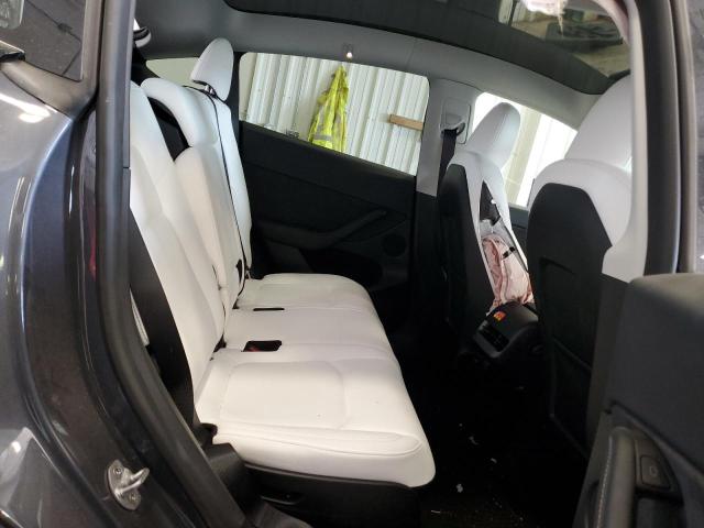 Photo 11 from auction – 2023 TESLA MODEL Y with VIN 7SAYGAEE9PF980013