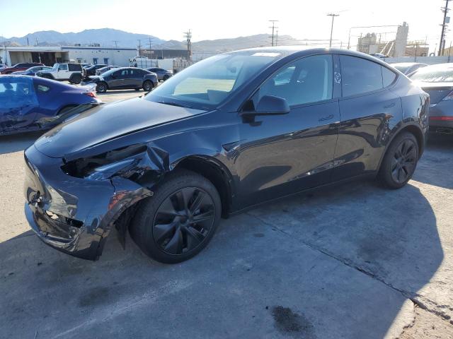 TESLA MODEL Y 2025 with VIN 7SAYGDED3SF228955 - Photo from auction