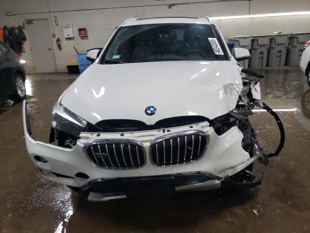 Photo 5 from auction – 2016 BMW X1 XDRIVE2 with VIN WBXHT3C3XG5E51117