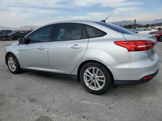 Снимка 2 от търг – 2018 FORD FOCUS SE с VIN 1FADP3FE5JL286547
