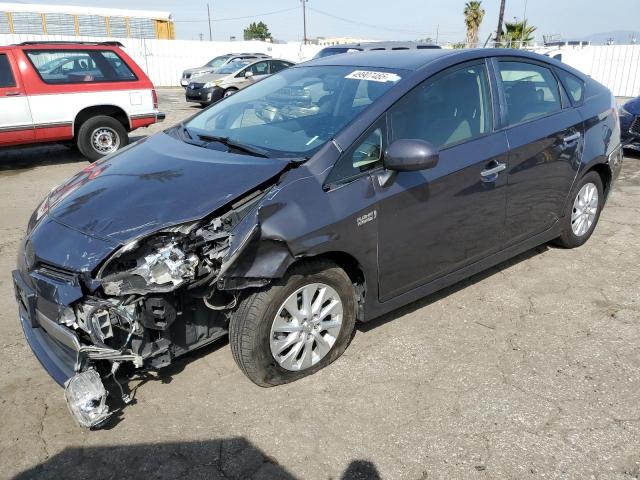 Снимка 1 от търг – 2014 TOYOTA PRIUS PLUG с VIN JTDKN3DP2E3062248