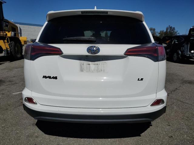 Photo 6 from auction – 2018 TOYOTA RAV4 LE with VIN 2T3ZFREV2JW460627