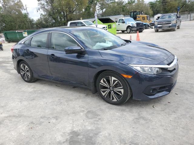 Photo 4 from auction – 2018 HONDA CIVIC EX with VIN JHMFC1F36JX009687