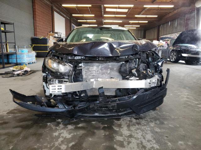 Photo 5 from auction – 2018 HONDA CIVIC LX with VIN 2HGFC2F55JH579615