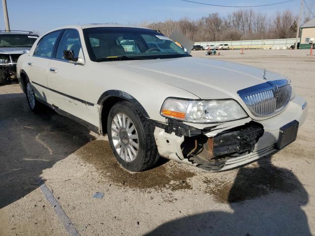 Photo 4 from auction – 2004 LINCOLN TOWN CAR U with VIN 1LNHM83W74Y670704