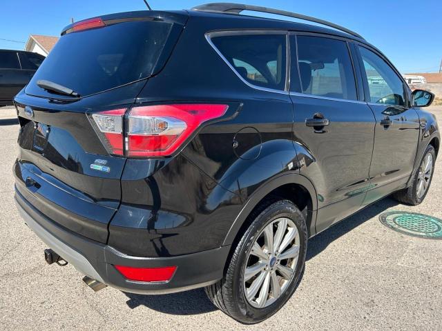 Photo 4 from auction – 2018 FORD ESCAPE SE with VIN 1FMCU9GD7JUA39057