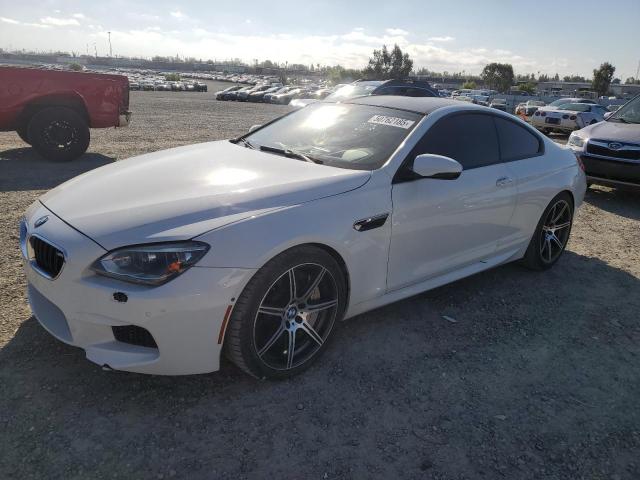 BMW M6 2014 with VIN WBSLX9C51ED160143 - Photo from auction