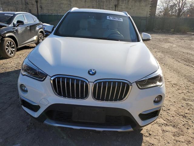 Photo 5 from auction – 2017 BMW X1 XDRIVE2 with VIN WBXHT3C32H5F77716