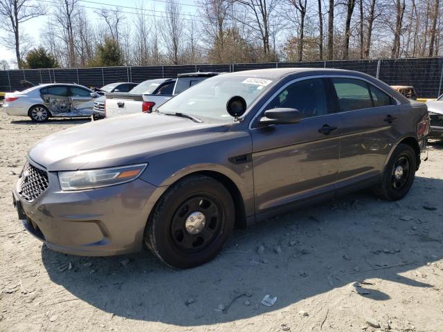 FORD TAURUS POL 2015 with VIN 1FAHP2MK7FG180573 - Photo from auction