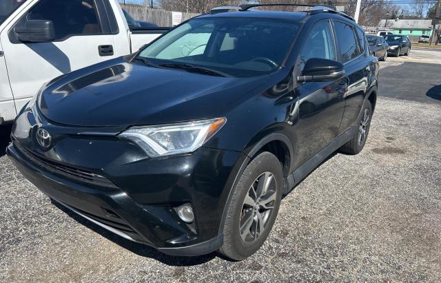 Photo 2 from auction – 2016 TOYOTA RAV4 XLE with VIN 2T3RFREV7GW506039