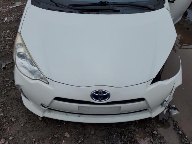 Photo 11 from auction – 2013 TOYOTA PRIUS C with VIN JTDKDTB35D1046140
