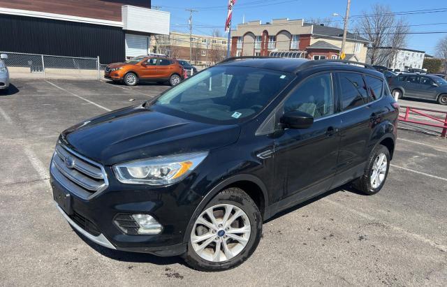 Photo 2 from auction – 2018 FORD ESCAPE SE with VIN 1FMCU0GD4JUD10233