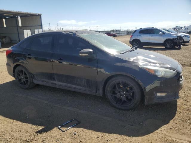 Снимка 4 от търг – 2016 FORD FOCUS SE с VIN 1FADP3F20GL256127
