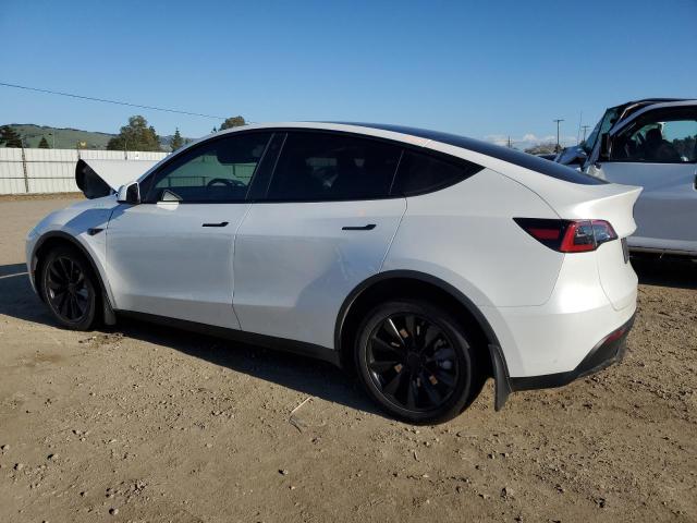 Снимка 2 от търг – 2023 TESLA MODEL Y с VIN 7SAYGDEE5PF740779