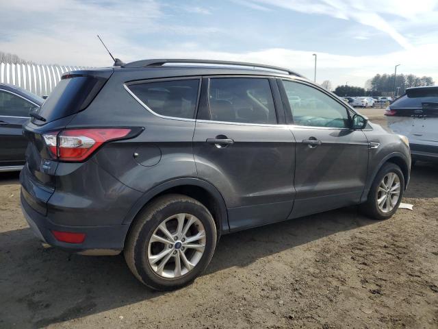 Photo 3 from auction – 2018 FORD ESCAPE SE with VIN 1FMCU9GD9JUC98388