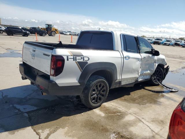 Photo 3 from auction – 2022 HONDA RIDGELINE with VIN 5FPYK3F72NB018843