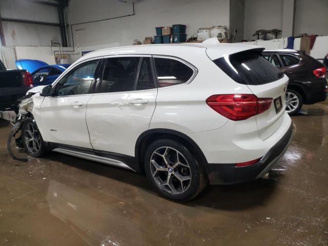Photo 2 from auction – 2016 BMW X1 XDRIVE2 with VIN WBXHT3C3XG5E51117